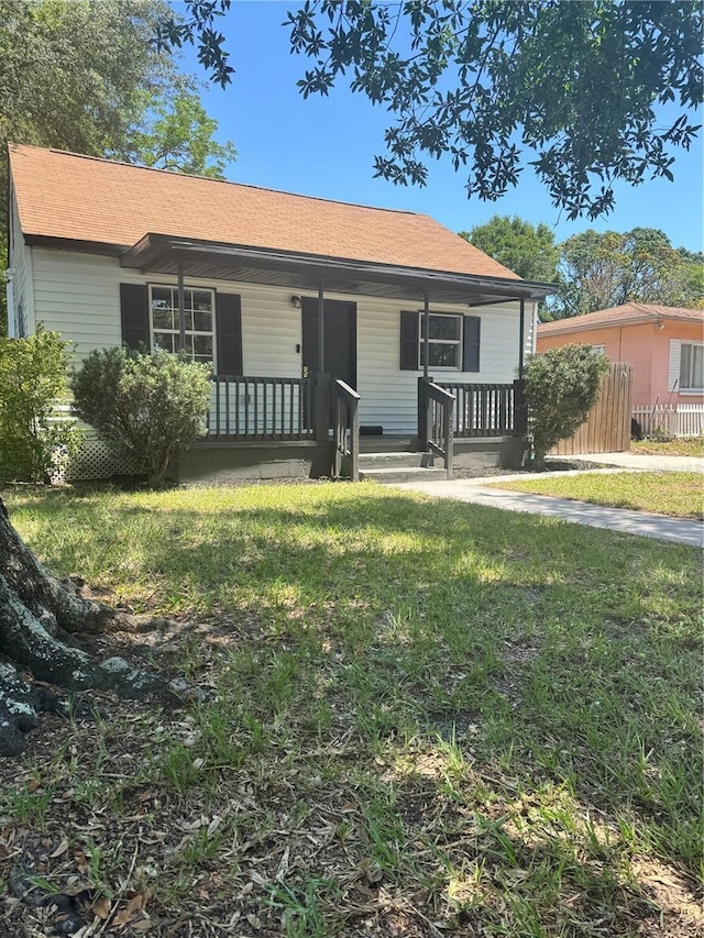1675 13th Ave S, Saint Petersburg, FL 33712 - single story home featuring covered porch and roof with shingles