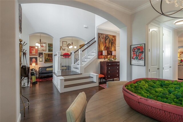 8927 Key W Island Way, Riverview, FL 33578 - entryway featuring a chandelier, ornamental molding, wood-type flooring, and stairway