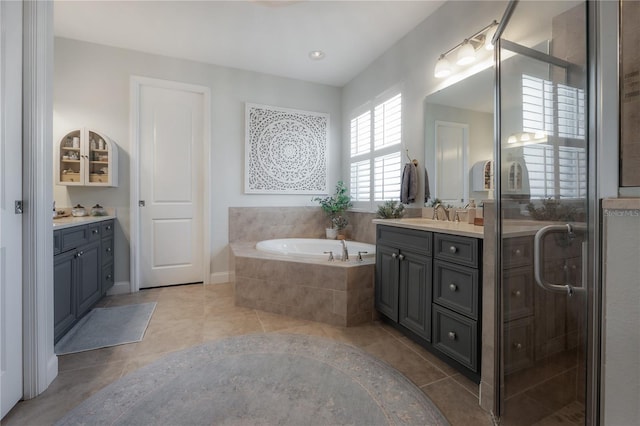 8927 Key W Island Way, Riverview, FL 33578 - full bath with a garden tub, vanity, a stall shower, and tile patterned flooring