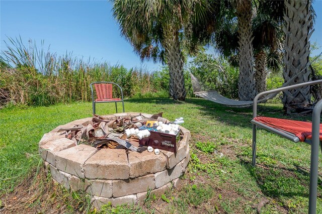 8927 Key W Island Way, Riverview, FL 33578 - view of green lawn featuring a fire pit