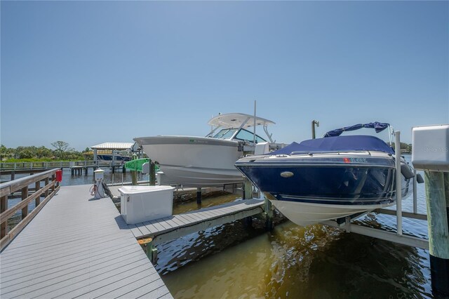 8927 Key W Island Way, Riverview, FL 33578 - dock featuring boat lift and a water view