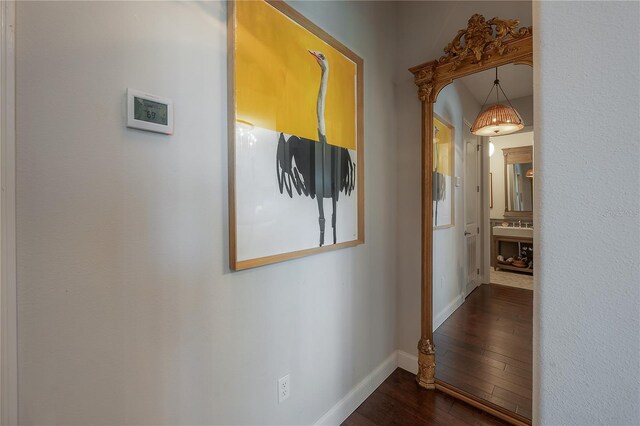 8927 Key W Island Way, Riverview, FL 33578 - hallway with dark wood-type flooring and baseboards