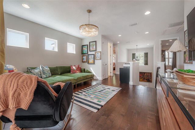 8927 Key W Island Way, Riverview, FL 33578 - living area featuring dark wood-style floors, recessed lighting, a chandelier, and baseboards