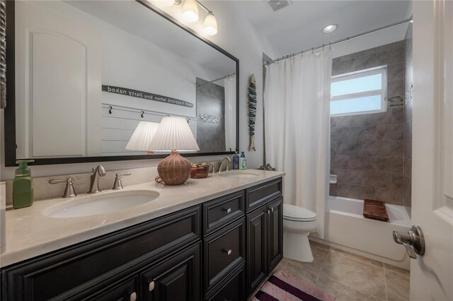 8927 Key W Island Way, Riverview, FL 33578 - bathroom with toilet, double vanity, shower / bathtub combination with curtain, and tile patterned floors