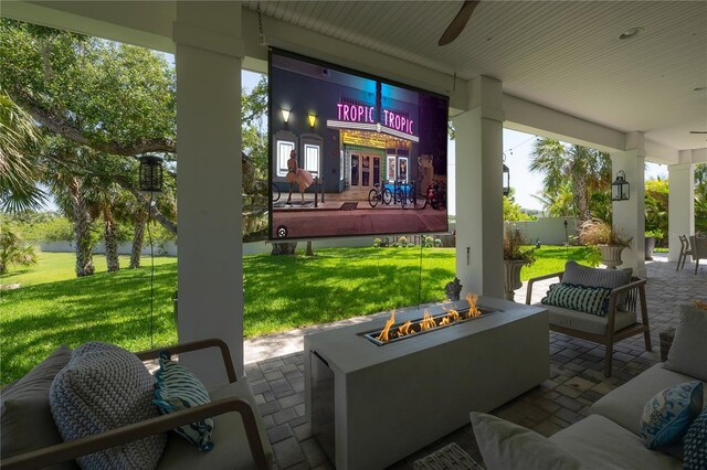 8927 Key W Island Way, Riverview, FL 33578 - view of patio with ceiling fan and an outdoor living space with a fire pit