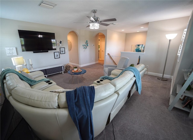 13103 Monach Isles Dr, Riverview, FL 33579 - living room featuring arched walkways, carpet floors, a ceiling fan, baseboards, and recessed lighting