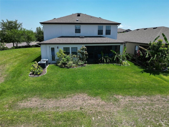 13103 Monach Isles Dr, Riverview, FL 33579 - back of house featuring a yard and central air condition unit