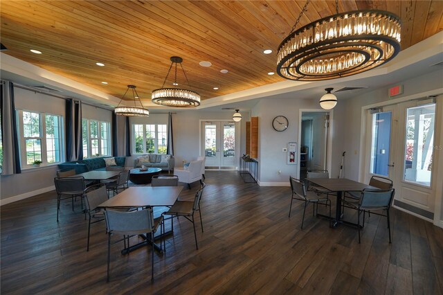 13103 Monach Isles Dr, Riverview, FL 33579 - dining room featuring wood ceiling, dark wood-style flooring, recessed lighting, a tray ceiling, and baseboards