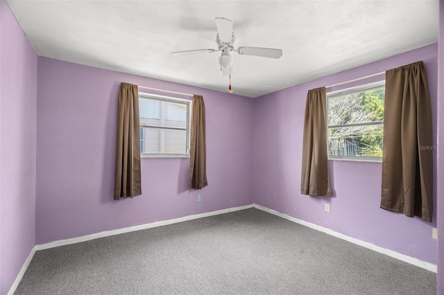 3348 Clydesdale Dr, Holiday, FL 34691 - empty room with baseboards, a ceiling fan, and carpet