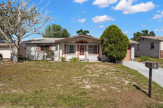 3348 Clydesdale Dr, Holiday, FL 34691 - single story home with a front lawn and a garage