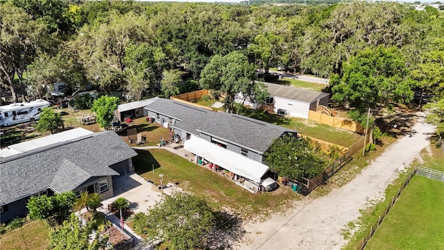 view from above of property with a forest