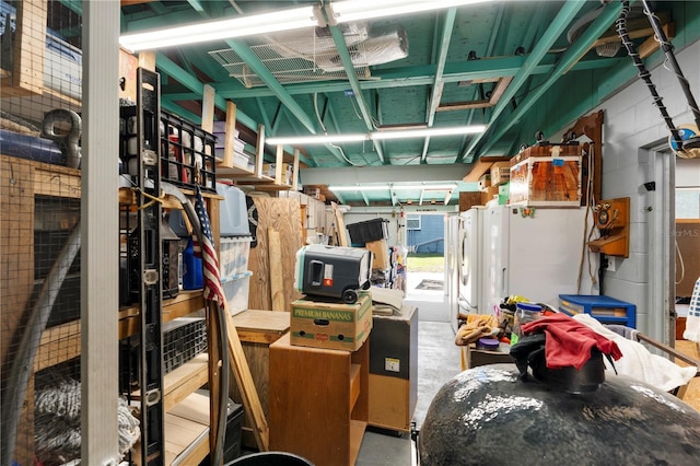 garage with concrete block wall