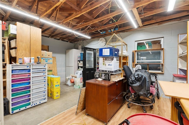 basement featuring concrete block wall