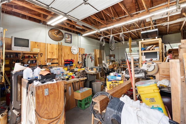 garage with a workshop area