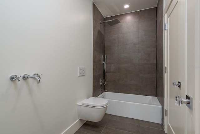 3752 Arkansas Ave NE, Saint Petersburg, FL 33703 - full bath with toilet, tile patterned floors, shower / tub combination, and baseboards
