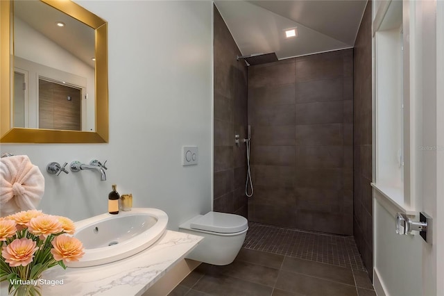3752 Arkansas Ave NE, Saint Petersburg, FL 33703 - bathroom with tiled shower, tile patterned floors, toilet, and vanity