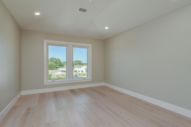 3752 Arkansas Ave NE, Saint Petersburg, FL 33703 - unfurnished room with light wood finished floors, baseboards, and recessed lighting