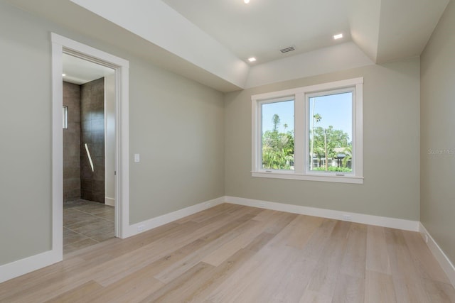 3752 Arkansas Ave NE, Saint Petersburg, FL 33703 - empty room featuring wood finished floors, baseboards, and recessed lighting