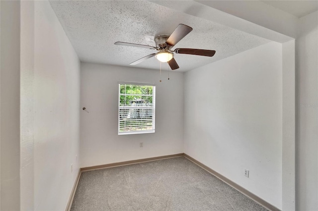 1920 E Chelsea St, Tampa, FL 33610 - empty room with a textured ceiling, baseboards, carpet flooring, and a ceiling fan