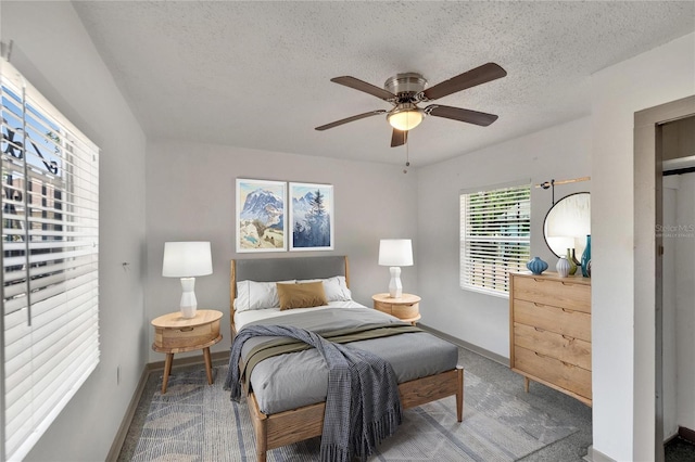 1920 E Chelsea St, Tampa, FL 33610 - bedroom with baseboards, a textured ceiling, carpet flooring, and ceiling fan