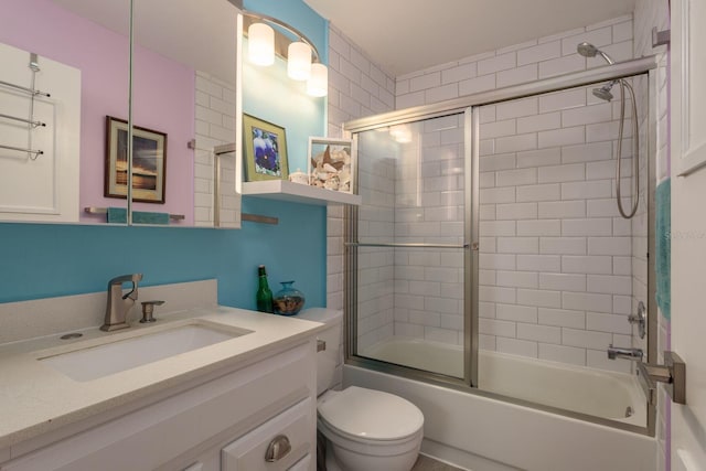 1065 Tartan Dr Unit C, Palm Harbor, FL 34684 - full bath with toilet, vanity, and combined bath / shower with glass door