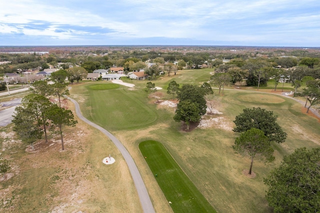 1065 Tartan Dr Unit C, Palm Harbor, FL 34684 - aerial view of property and surrounding area featuring a golf course and a tree filled landscape