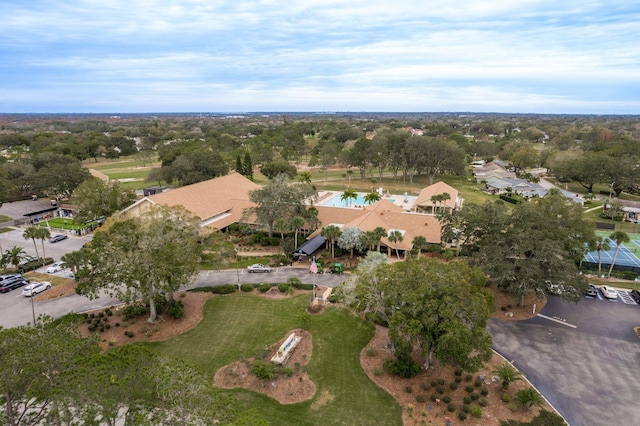 1065 Tartan Dr Unit C, Palm Harbor, FL 34684 - aerial overview of property's location with a tree filled landscape