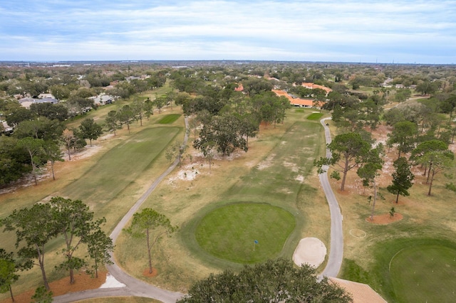 1065 Tartan Dr Unit C, Palm Harbor, FL 34684 - aerial overview of property's location with a golf course and a tree filled landscape