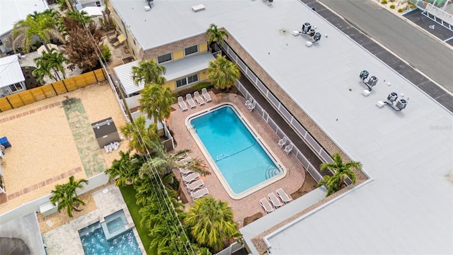 600 71st Ave Unit 18, St Pete Beach, FL 33706 - view from above of property featuring a pool area