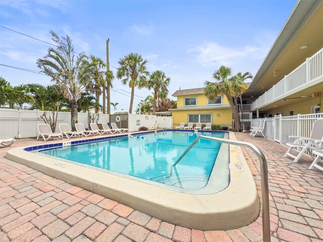 600 71st Ave Unit 18, St Pete Beach, FL 33706 - community pool with a patio area