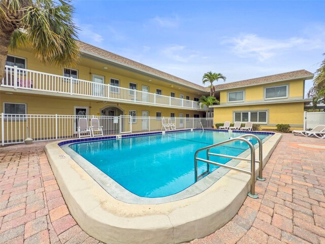 600 71st Ave Unit 18, St Pete Beach, FL 33706 - community pool with a patio area
