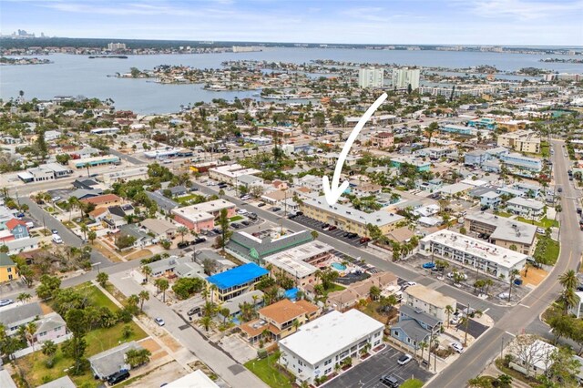 600 71st Ave Unit 18, St Pete Beach, FL 33706 - aerial view of property and surrounding area with a large body of water