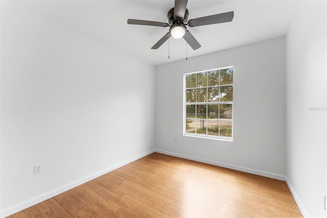 2313 Palm Ave, Seffner, FL 33584 - unfurnished room with light wood finished floors, baseboards, and ceiling fan