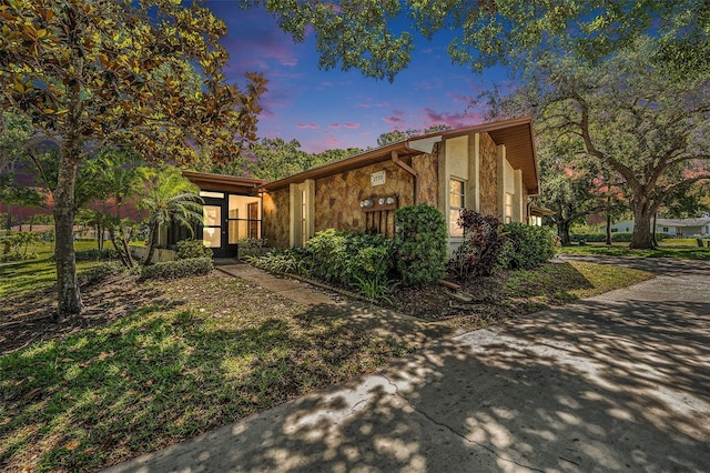 2770 Keats Ter Unit C, Palm Harbor, FL 34684 - mid-century inspired home with stone siding