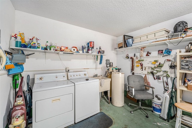 2770 Keats Ter Unit C, Palm Harbor, FL 34684 - laundry room featuring separate washer and dryer and a textured ceiling