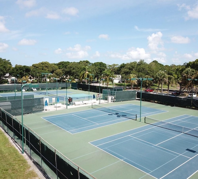 2770 Keats Ter Unit C, Palm Harbor, FL 34684 - view of tennis court with view of wooded area