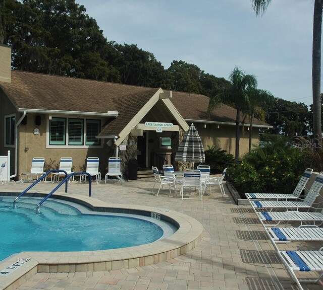 2770 Keats Ter Unit C, Palm Harbor, FL 34684 - community pool with a patio