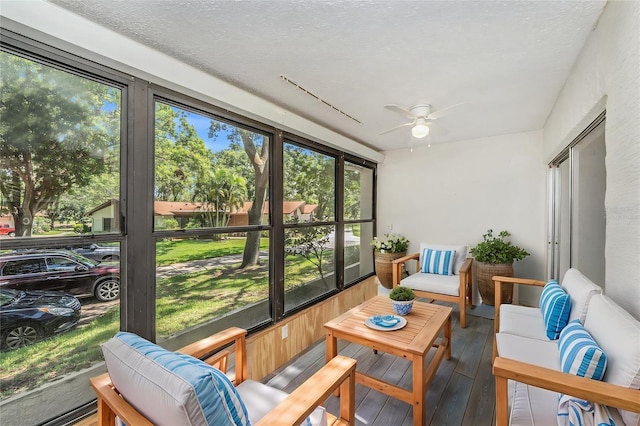 2770 Keats Ter Unit C, Palm Harbor, FL 34684 - sunroom / solarium featuring a ceiling fan, an outdoor hangout area, and healthy amount of natural light