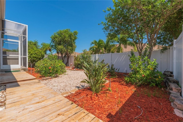 1126 Haley Ln, Dunedin, FL 34698 - wooden terrace featuring a fenced backyard