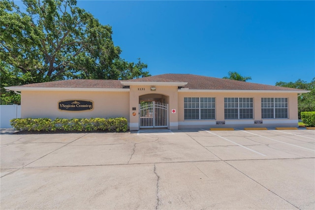 1126 Haley Ln, Dunedin, FL 34698 - view of property featuring uncovered parking