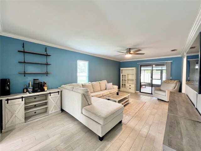 7360 Ulmerton Rd Unit 16A, Largo, FL 33771 - living area with light wood-type flooring, ceiling fan, and ornamental molding