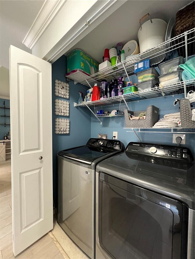 7360 Ulmerton Rd Unit 16A, Largo, FL 33771 - clothes washing area featuring washer and dryer