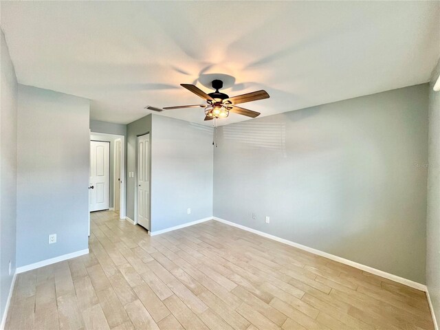 7360 Ulmerton Rd Unit 16A, Largo, FL 33771 - unfurnished room featuring ceiling fan, light wood-style flooring, and baseboards