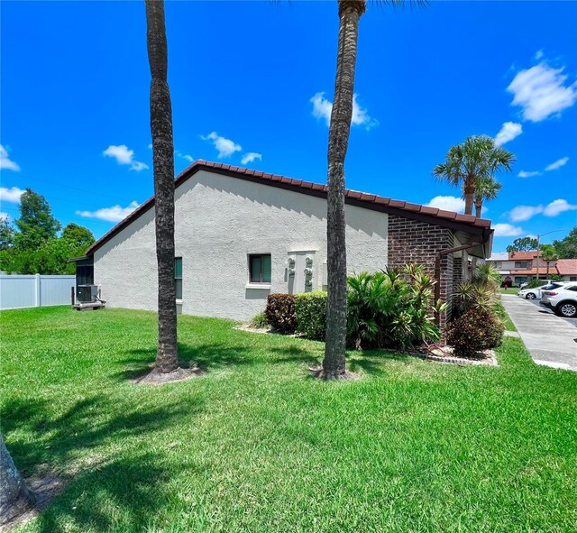 7360 Ulmerton Rd Unit 16A, Largo, FL 33771 - view of side of property featuring stucco siding