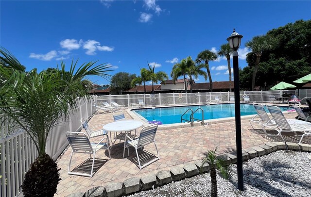 7360 Ulmerton Rd Unit 16A, Largo, FL 33771 - community pool featuring fence and a patio area