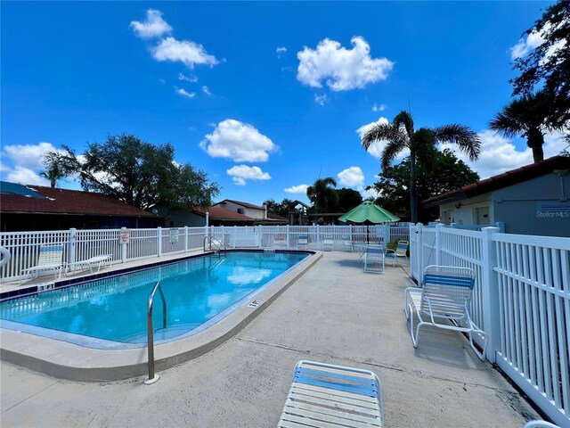 7360 Ulmerton Rd Unit 16A, Largo, FL 33771 - community pool featuring fence and a patio area