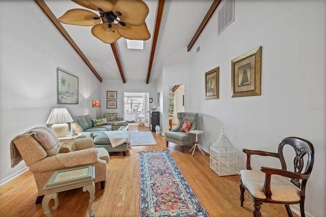 2665 Sequoia Ter Unit 306, Palm Harbor, FL 34683 - living area with a ceiling fan, baseboards, and wood finished floors