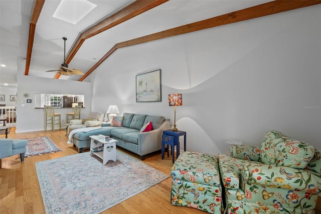 2665 Sequoia Ter Unit 306, Palm Harbor, FL 34683 - living room featuring a skylight, wood finished floors, and ceiling fan