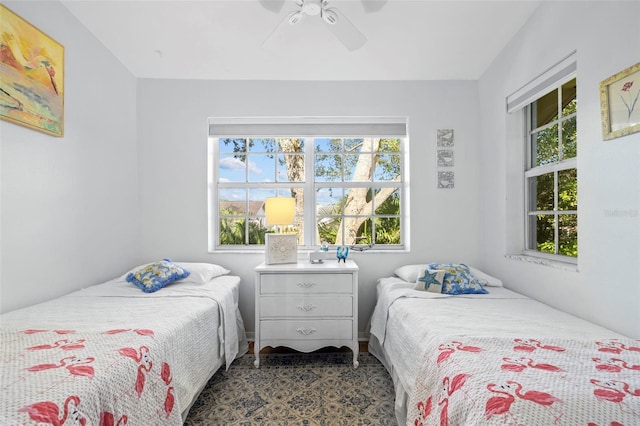 2665 Sequoia Ter Unit 306, Palm Harbor, FL 34683 - bedroom with multiple windows and ceiling fan