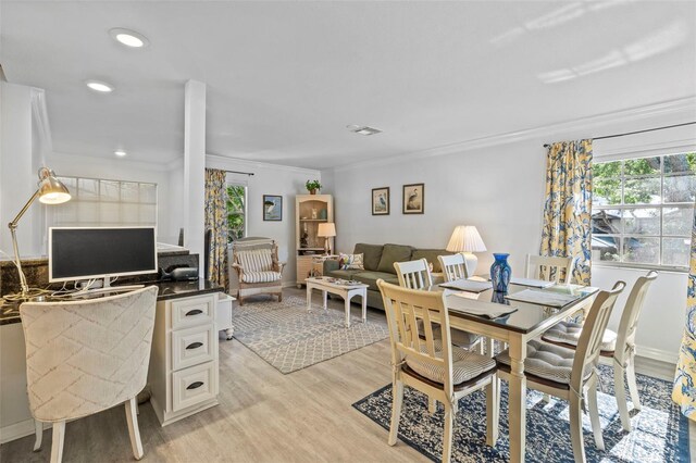 2665 Sequoia Ter Unit 306, Palm Harbor, FL 34683 - dining space featuring crown molding, plenty of natural light, light wood-style floors, and recessed lighting